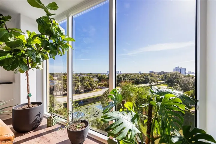 Sunroom / solarium with a city view