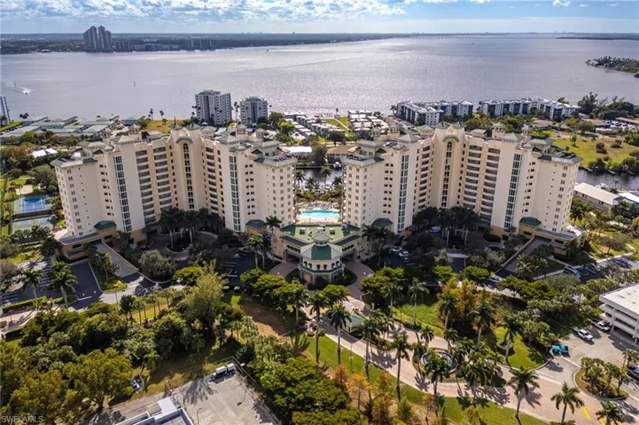 Aerial overview of property's location with a large body of water and nearby urban area
