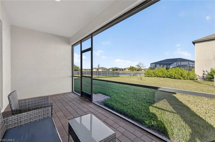 Unfurnished sunroom with a residential view