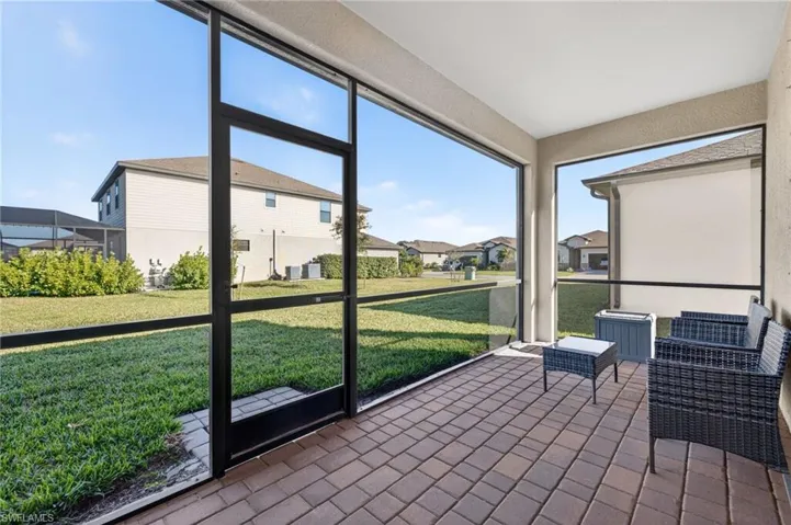 Sunroom with a residential view