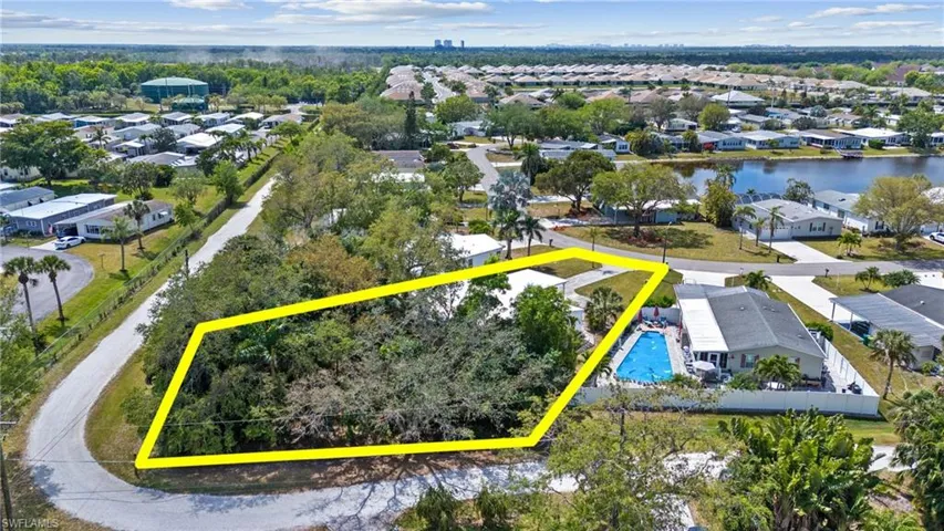 Bird's eye view with a residential view and a water view