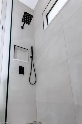 Bathroom with a tile shower