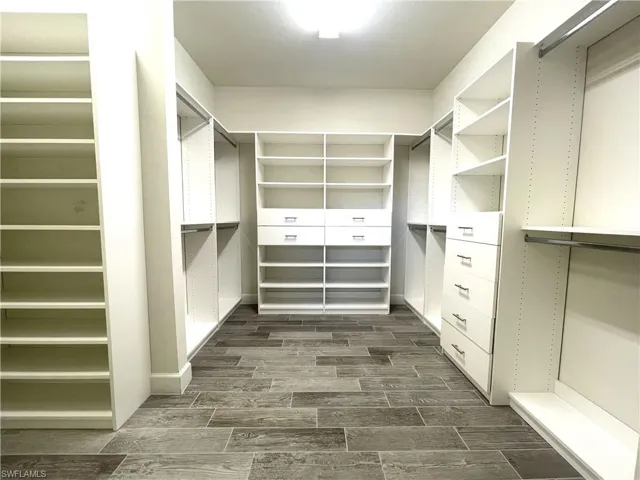 Primary Closet with Custom Built-in Shelving