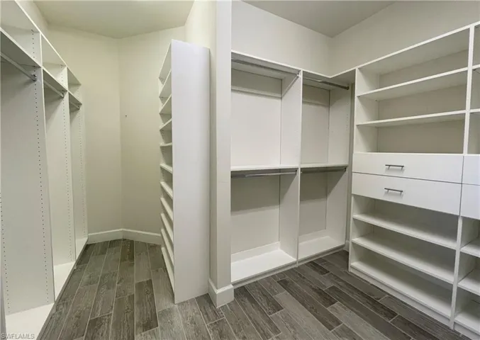 Primary Closet with Custom Built-in Shelving