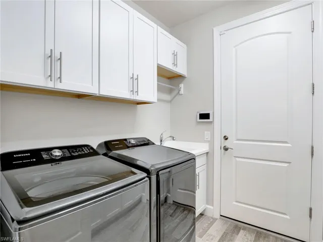 Laundry Room wth Upgraded Cabinet Storage