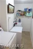 Laundry room with separate washer and dryer