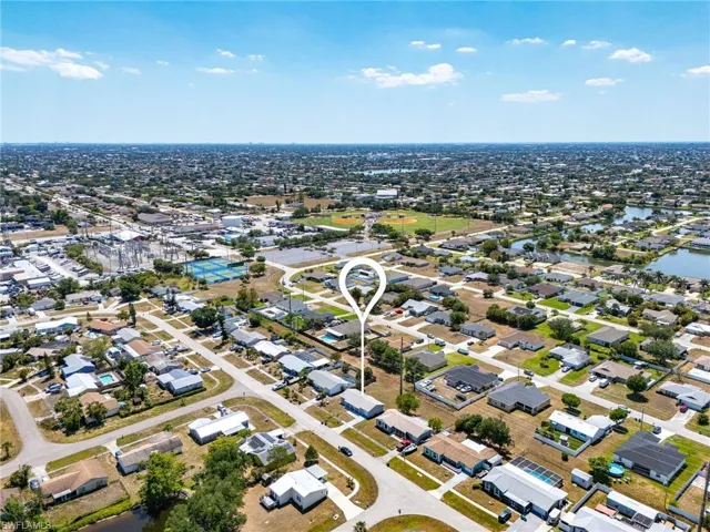 Aerial view with a residential view and a water view