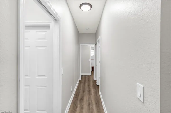 Hallway to Laundry, BR#2 ensuite and Guest BR#3