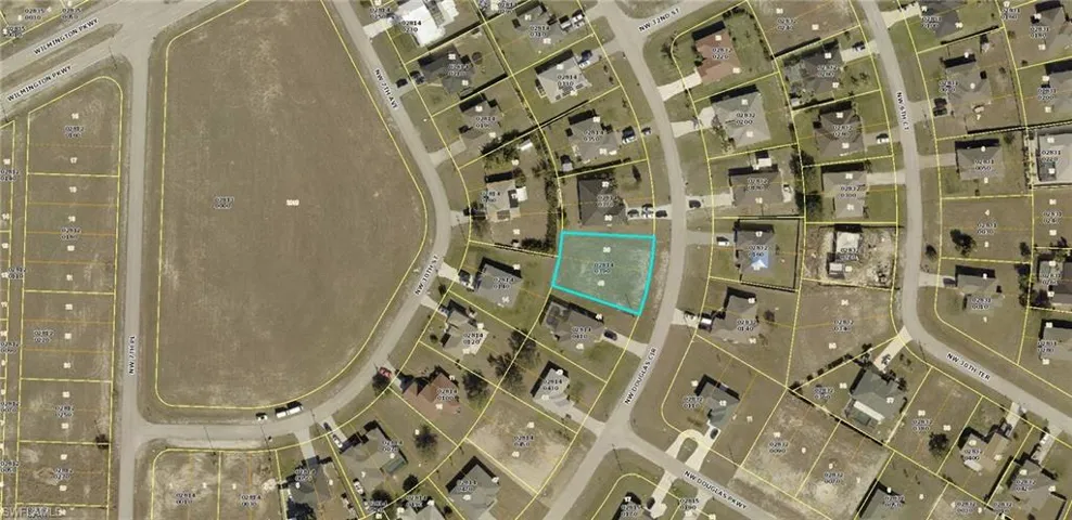 Aerial map of property and surrounding area featuring property parcel outlined