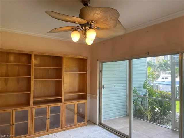 Living Room to Screened Lanai with Canal Views