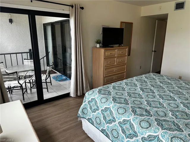 Bedroom featuring hardwood / wood-style flooring