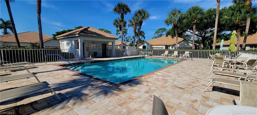 Community pool featuring a patio area