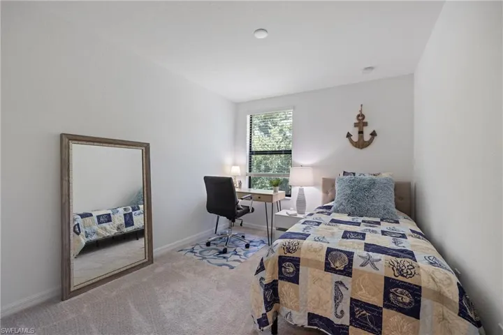 Bedroom featuring carpet floors
