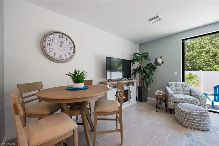 Dining room with light tile floors