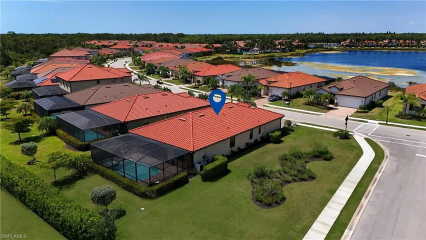 Prime corner lot home with pool overlooking a beautiful lake...