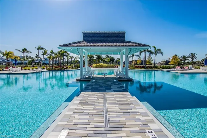 View of pool featuring a gazebo and decking.