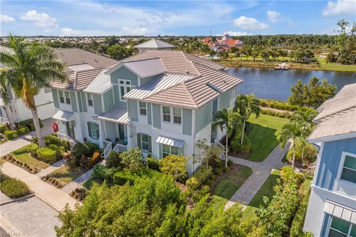 Birds eye view of property with a water. view