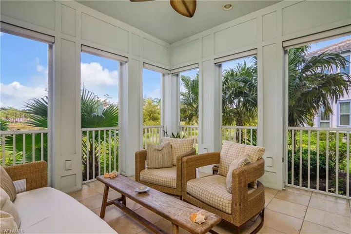 Roomy Screened Lanai with ceiling fan, pull down shades.