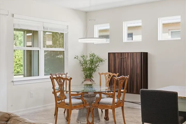 Dining area with healthy amount of natural light