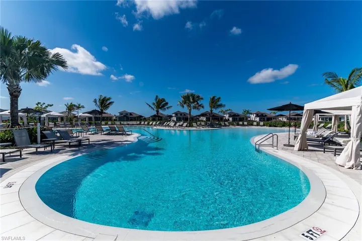 Pool featuring a residential view, a patio area, and a gazebo