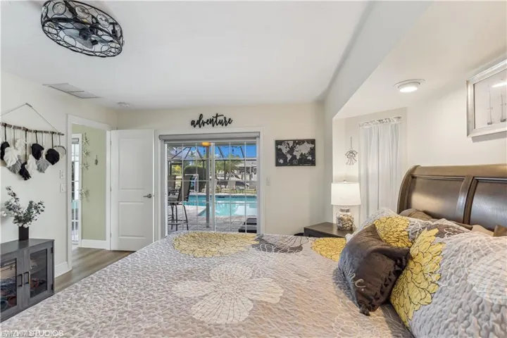 Master Suite with access to the pool with a lovely view.