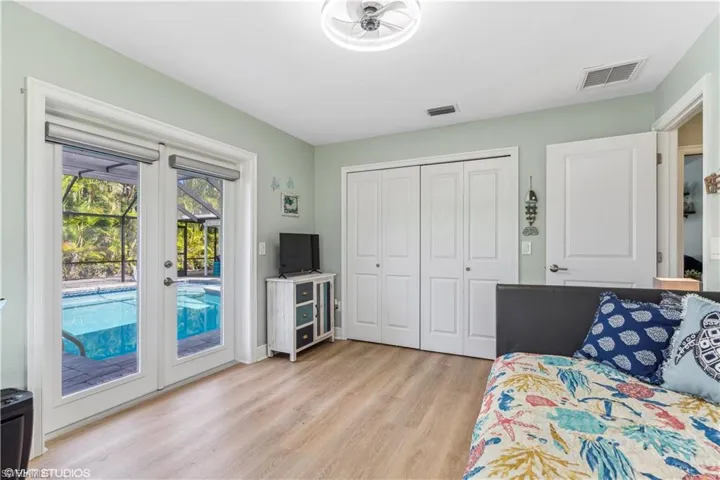 Bedroom #4 with beautiful pool view.