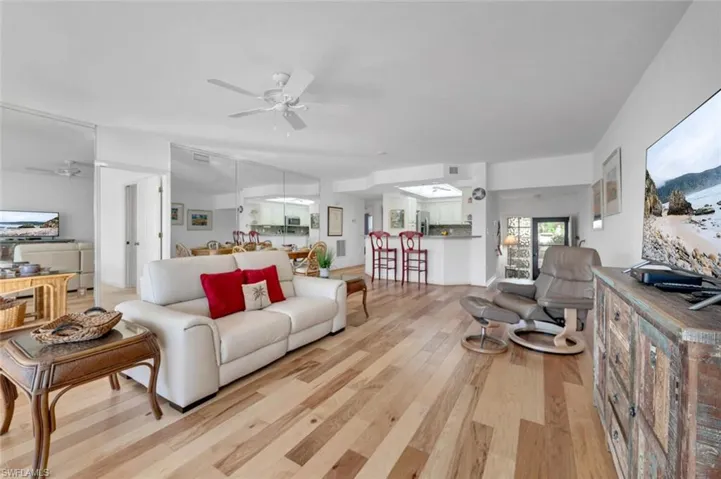 Wood floors add to the ambiance of the great room