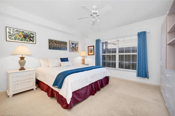 Guest bedroom with storage and desk that pulls out for easy work surface