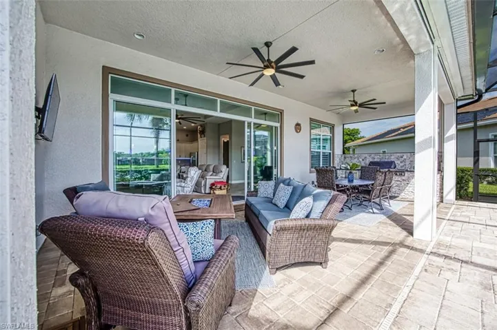 View of patio featuring ceiling fan and outdoor lounge area