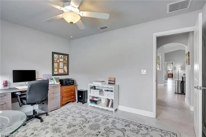 Tiled office space with ceiling fan