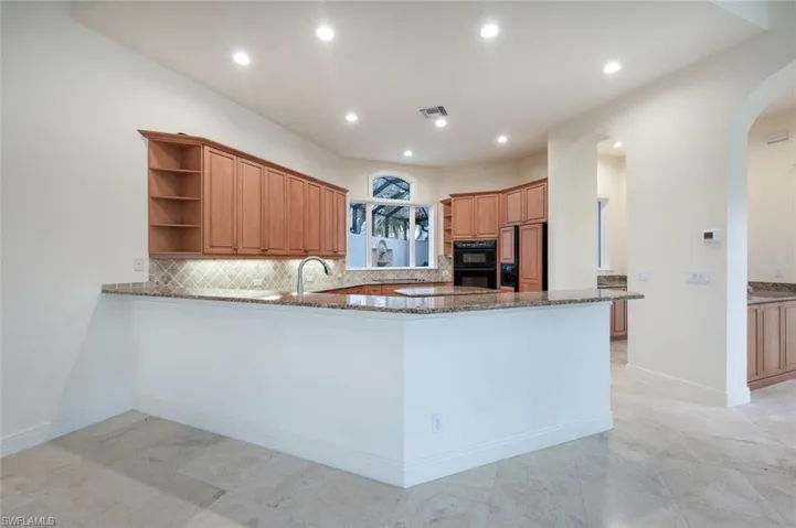 Great Room with Built-Ins and Beautiful Ship Lap Tray Ceiling