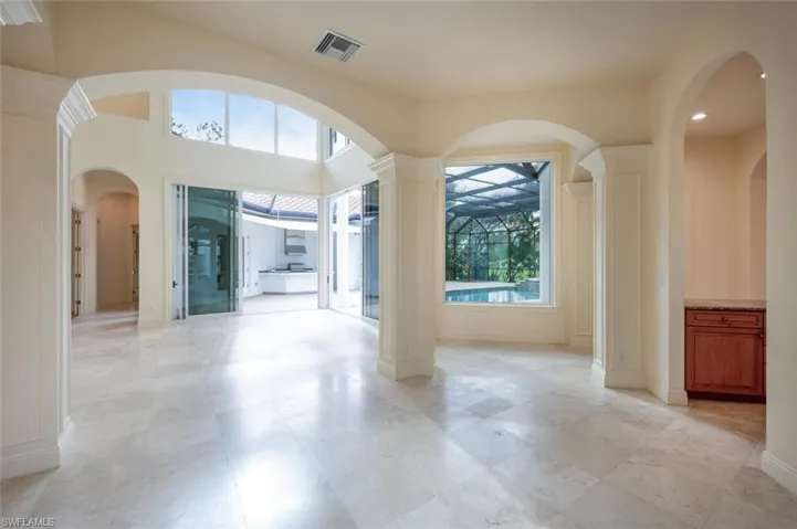 Dining Room access to the wet bar and private Lanai area