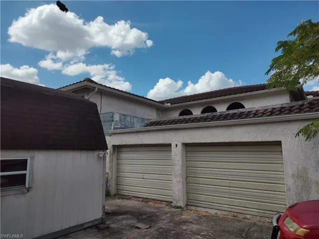 two car garage with seperate storage