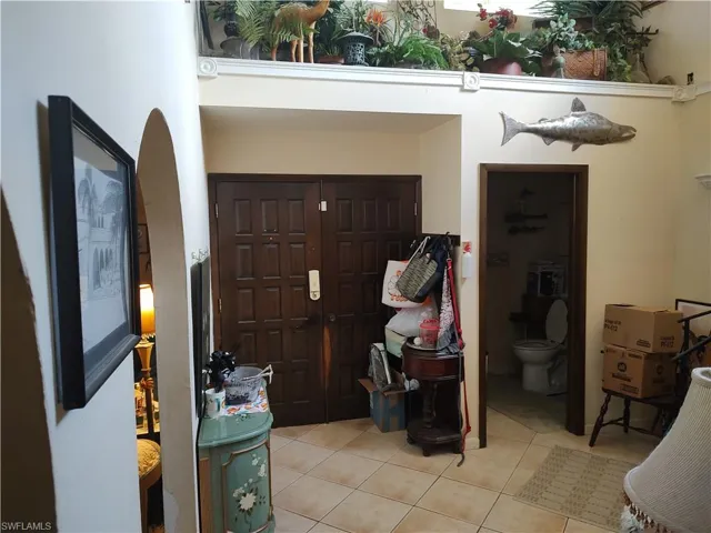 Entryway featuring light tile patterned floors