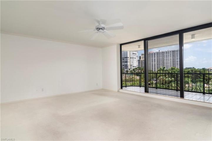The master suite is spacious with a private balcony.