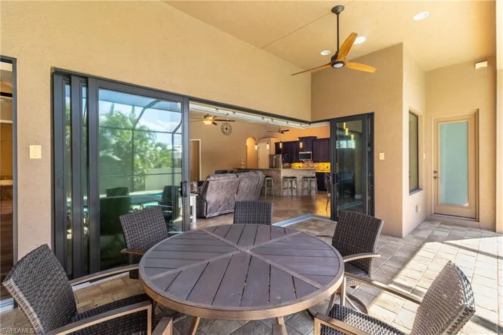 View of patio with ceiling fan