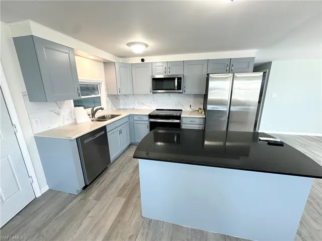 Kitchen with stainless steel appliances