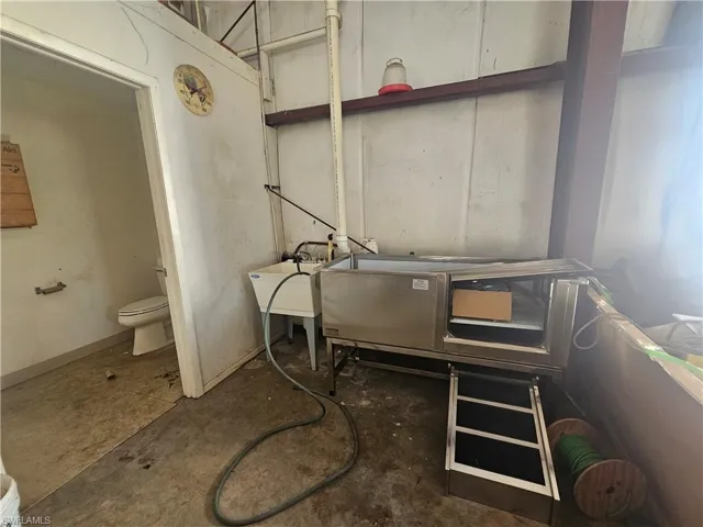 Misc room featuring a sink