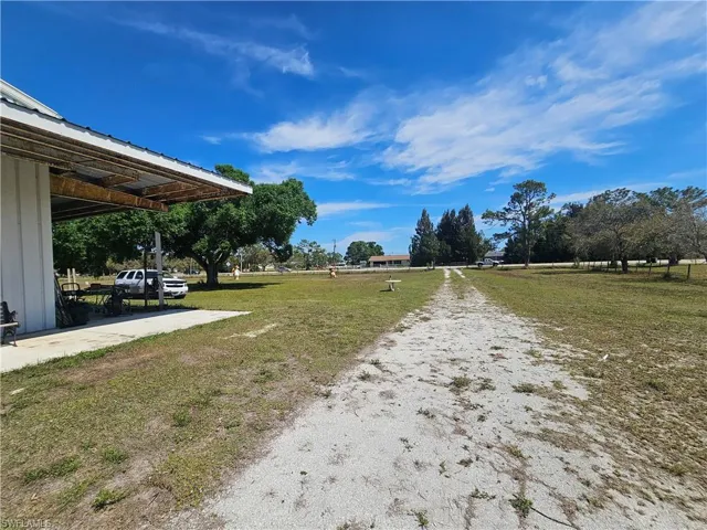 View of road. Parking on grass.