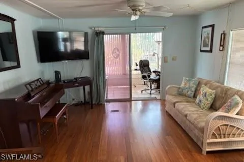 Living area with view to the air-conditioned Florida room.