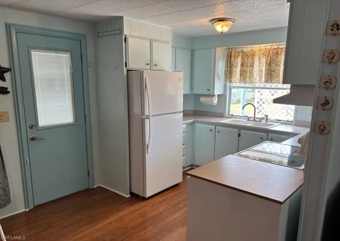 Lustrous wood laminate floors throughout this immaculate home!