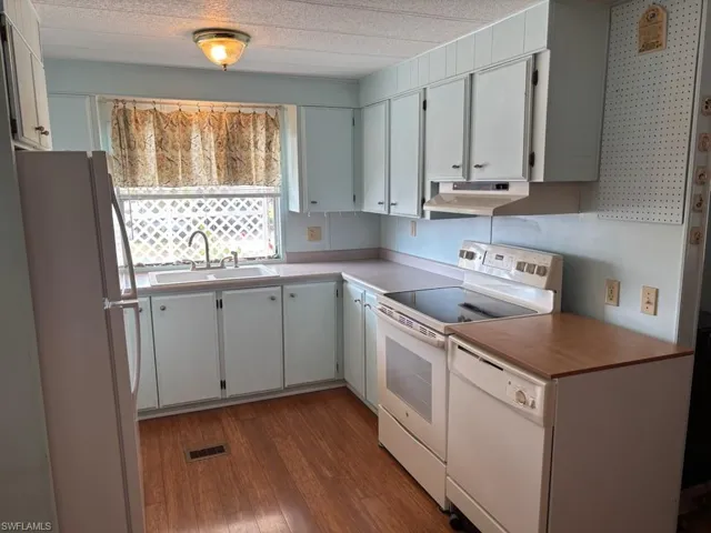 Fully-equipped kitchen includes dishwasher and microwave! This property sells furnished turnkey.