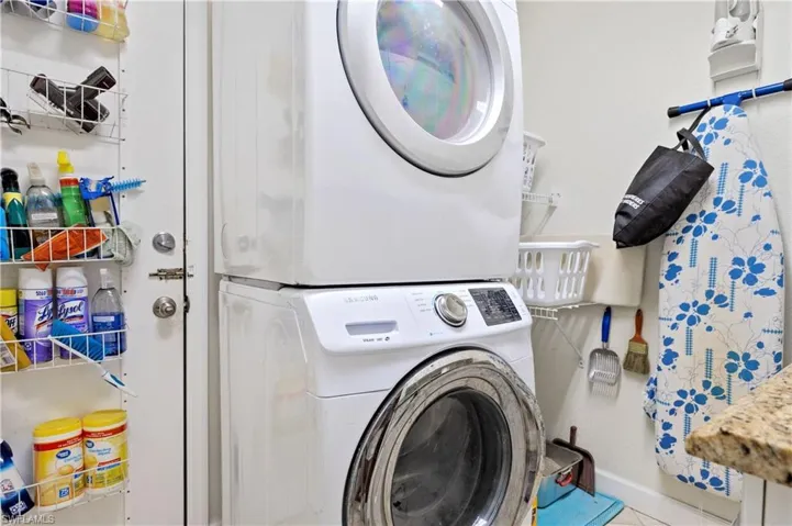 Laundry room with sink, countertop and cabinets