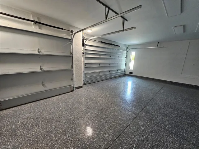 Linear garage door openers and epoxy garage floor