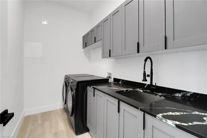 Laundry with upgrade front loading washer and dryer