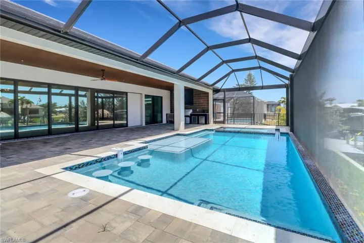 Pool cage with panoramic picture windows