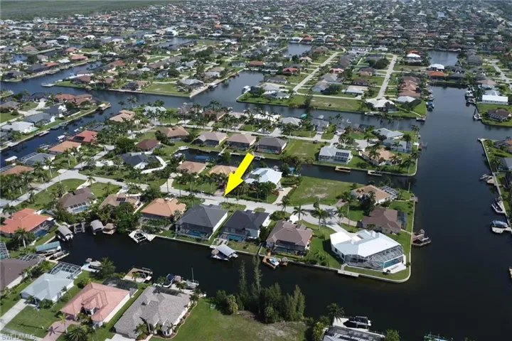 Southern rear exposure on a 115' wide canal with boat access to the Gulf