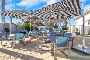 View of patio / terrace with outdoor dining space and a pergola