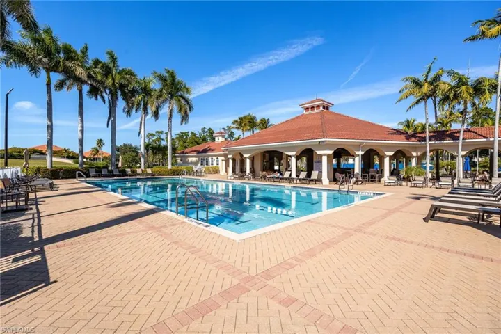 Community pool with a patio area