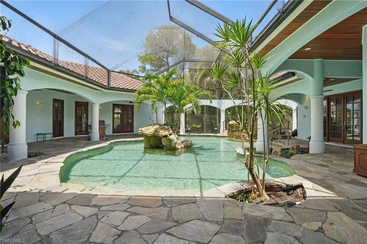 Serene lanai with pool and spa
